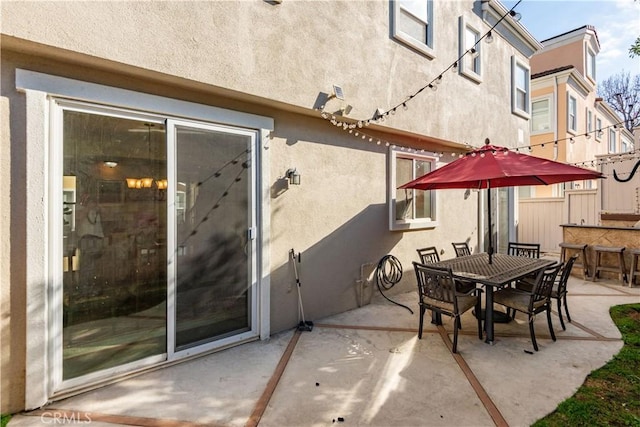 view of patio with an outdoor bar