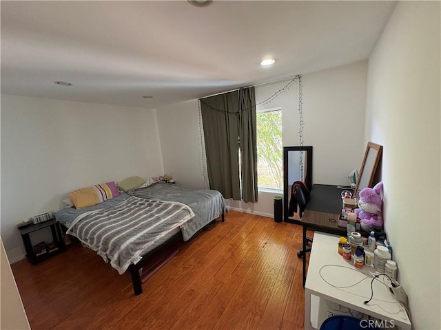 bedroom featuring hardwood / wood-style flooring