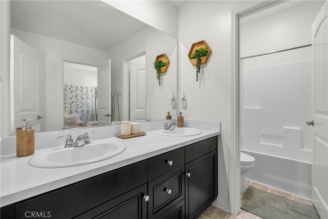 full bathroom featuring toilet, bathing tub / shower combination, tile patterned flooring, and vanity