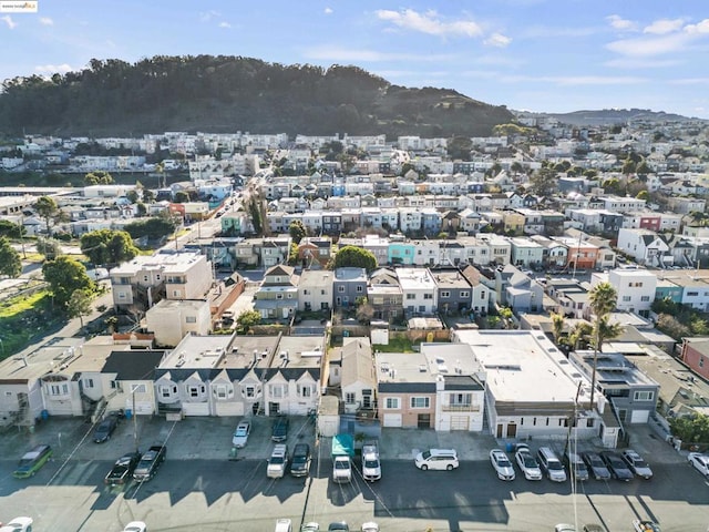 drone / aerial view featuring a mountain view