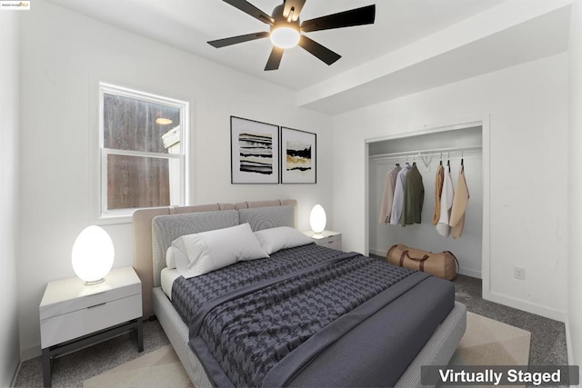 bedroom with ceiling fan, light carpet, and a closet