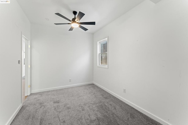 unfurnished room with carpet floors and ceiling fan