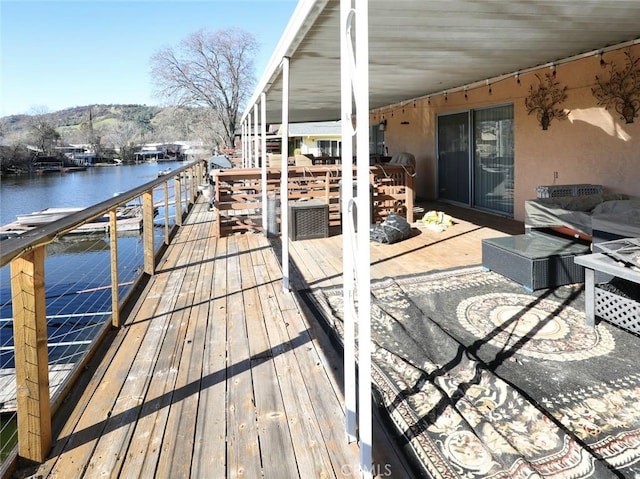 view of dock with a water view