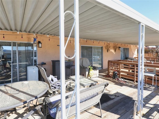 view of patio / terrace featuring a wooden deck