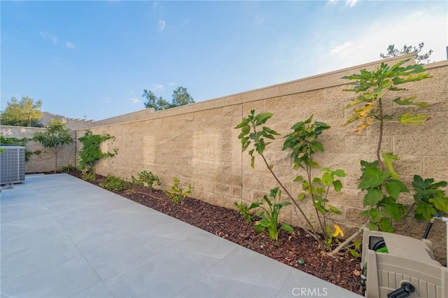 view of patio with central air condition unit