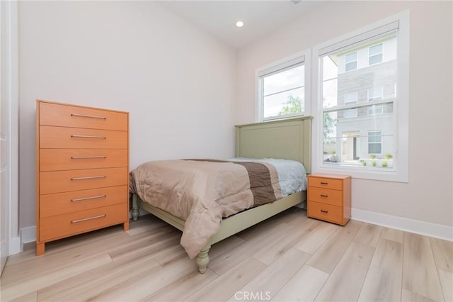 bedroom featuring light hardwood / wood-style floors