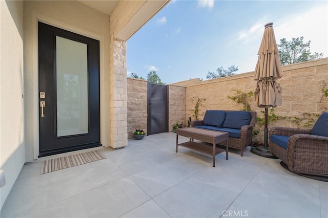 view of patio with an outdoor living space