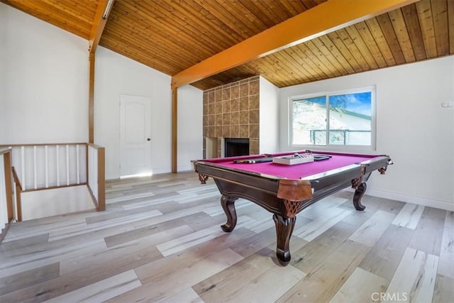 recreation room with a fireplace, wood ceiling, light hardwood / wood-style floors, and billiards