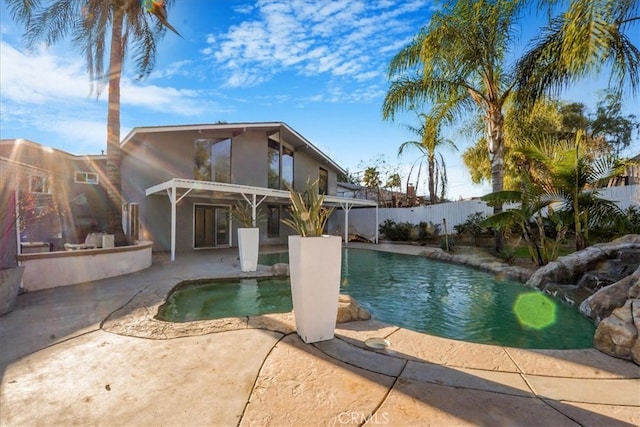 view of swimming pool with a pergola and a patio area