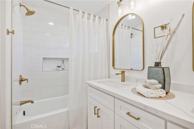 bathroom with shower / bath combo with shower curtain and vanity