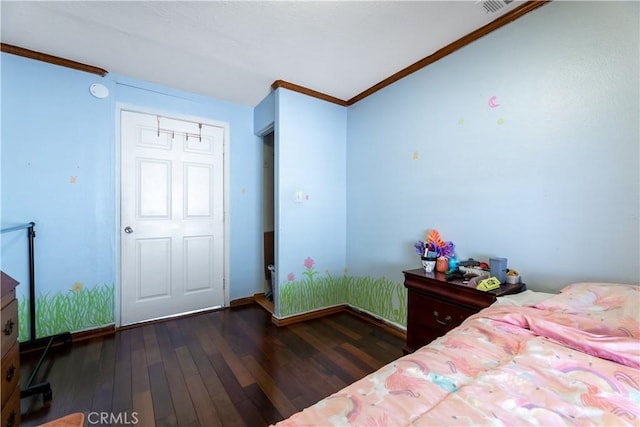 unfurnished bedroom featuring a closet, dark hardwood / wood-style flooring, and crown molding