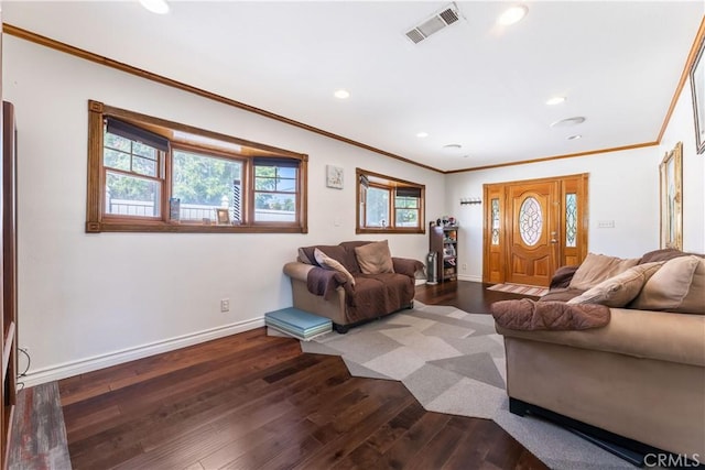 living room with dark wood-type flooring and crown molding