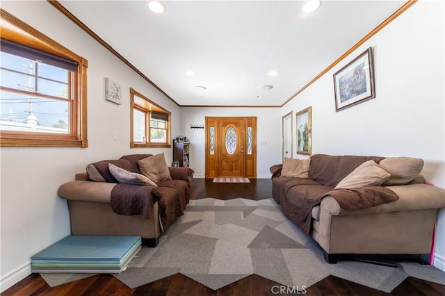 living room with crown molding and hardwood / wood-style flooring