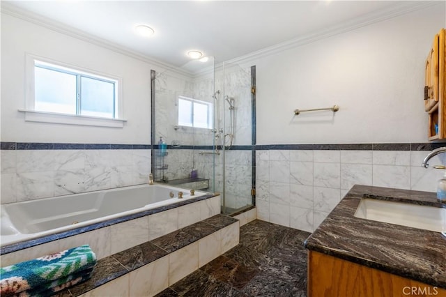 bathroom featuring vanity, ornamental molding, and shower with separate bathtub