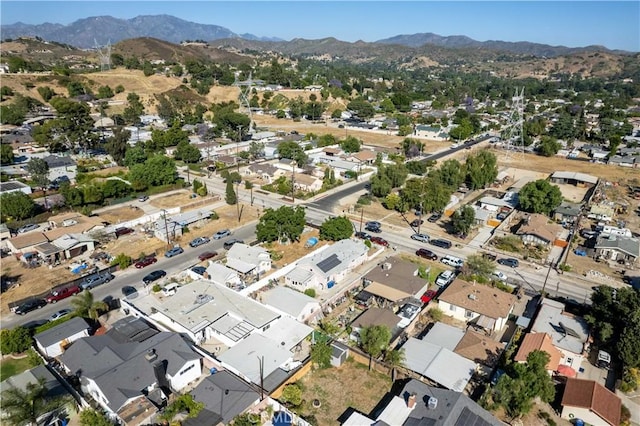 birds eye view of property featuring a mountain view