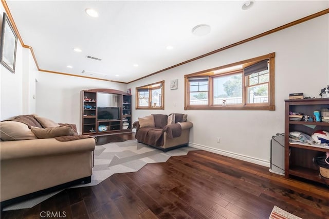 living room with dark wood-type flooring and crown molding