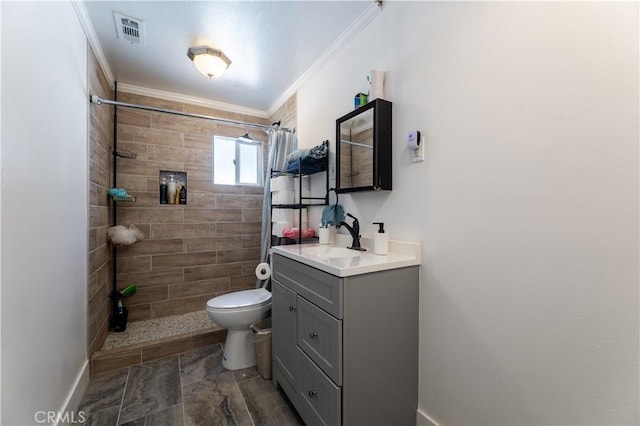 bathroom featuring toilet, a shower with shower curtain, ornamental molding, and vanity