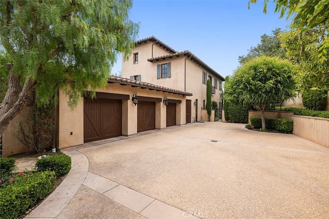 view of side of home with a garage