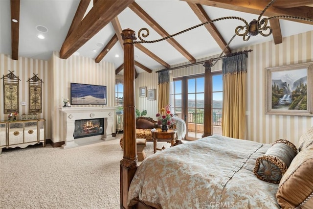 carpeted bedroom featuring vaulted ceiling with beams