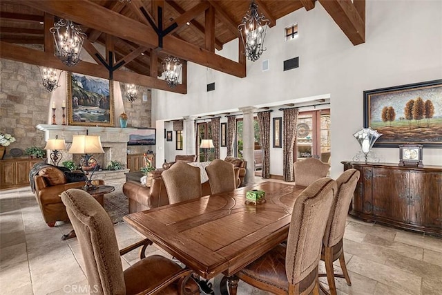 dining space with high vaulted ceiling, beam ceiling, and wood ceiling