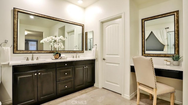 bathroom featuring vanity and tile patterned floors