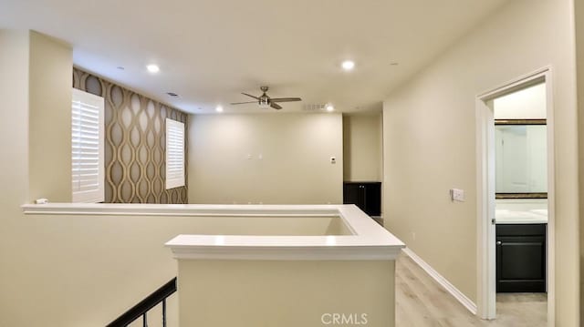 hallway featuring light hardwood / wood-style flooring