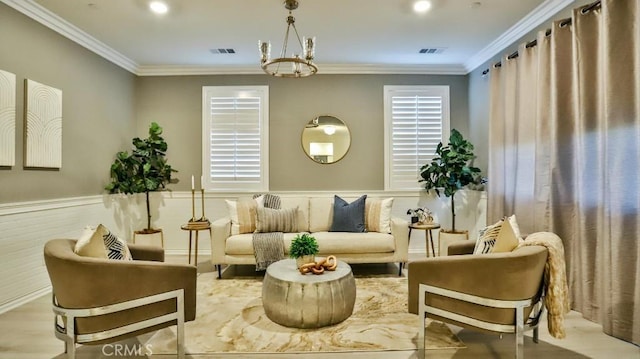 sitting room with a notable chandelier and ornamental molding