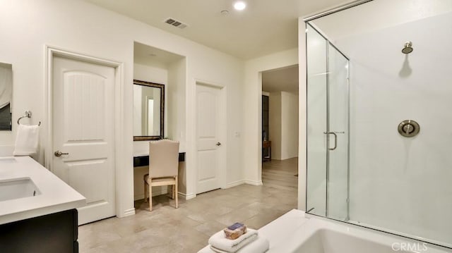 bathroom with vanity and plus walk in shower