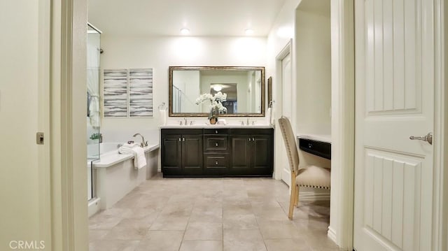 bathroom with vanity, tile patterned floors, and plus walk in shower