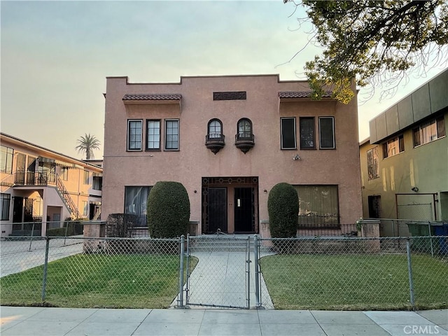 view of front of home with a yard