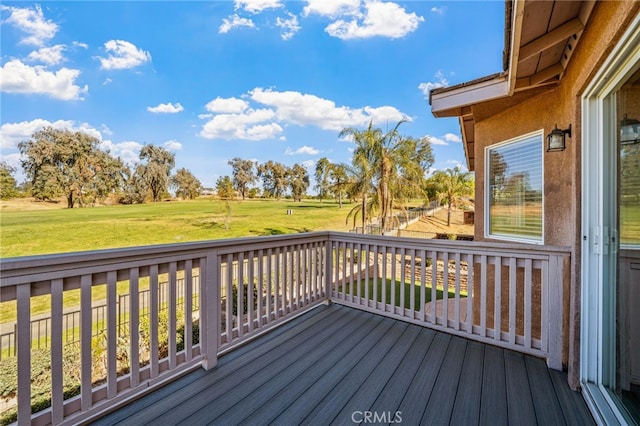 deck featuring a lawn