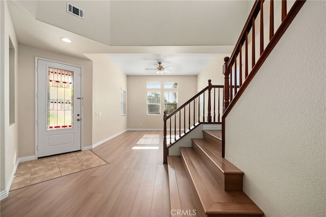 entrance foyer featuring ceiling fan and light hardwood / wood-style flooring