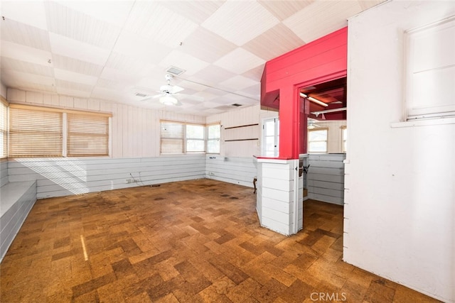 unfurnished room featuring ceiling fan