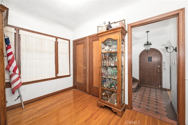 interior space with hardwood / wood-style flooring