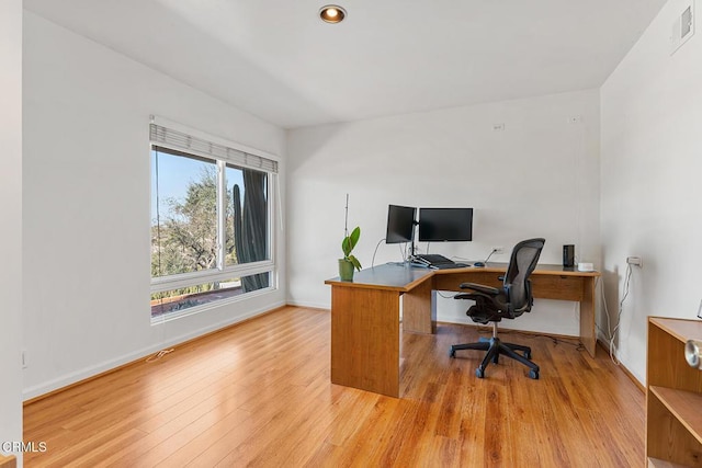 home office featuring light hardwood / wood-style floors