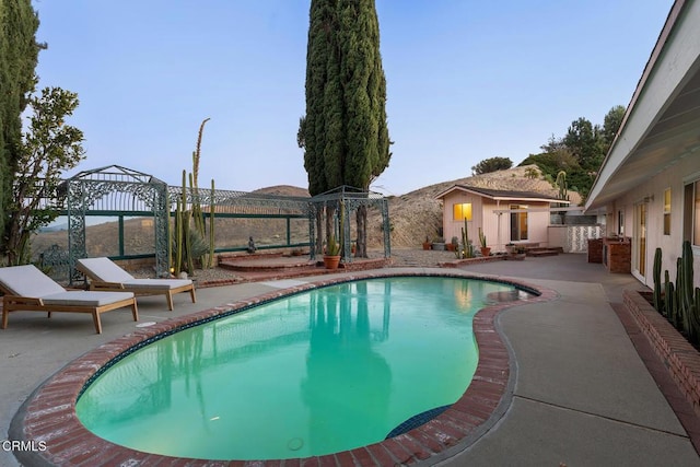 view of pool featuring a patio area and a gazebo