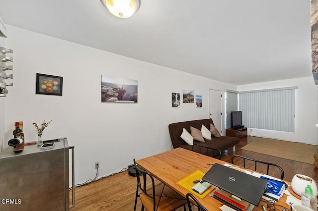 dining space featuring hardwood / wood-style floors