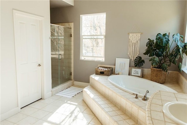 bathroom with tile patterned floors and separate shower and tub