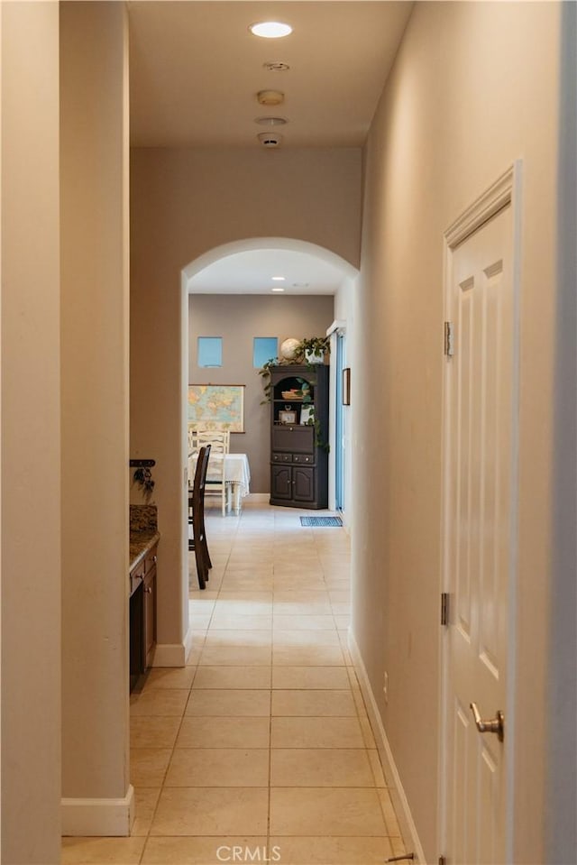 hallway with light tile patterned flooring