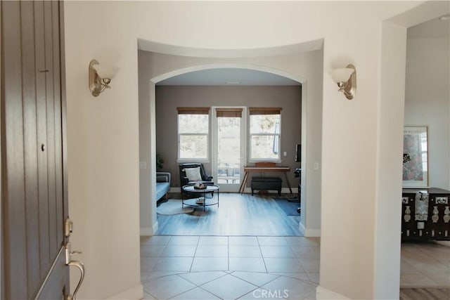 hallway with light tile patterned flooring