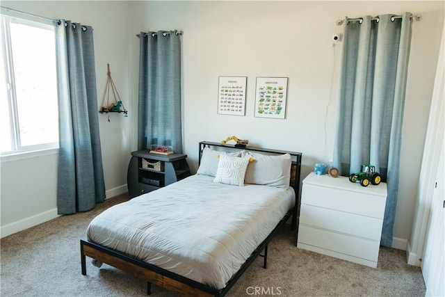 bedroom featuring carpet