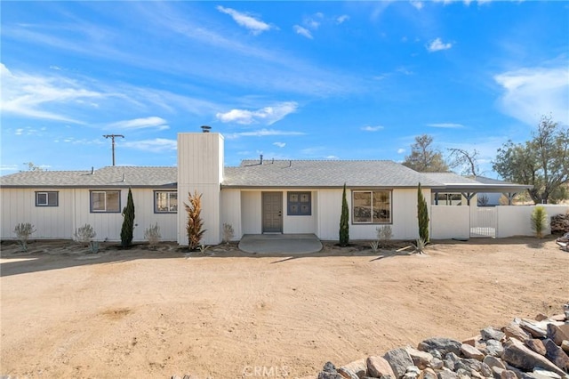 ranch-style home with a patio