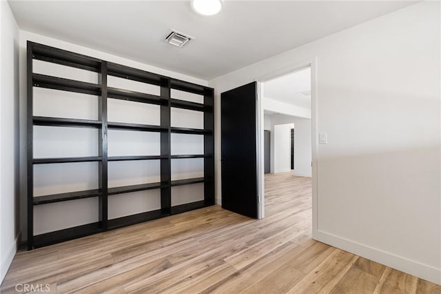 empty room featuring light hardwood / wood-style flooring