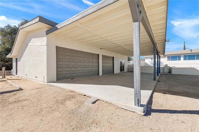 exterior space featuring a garage