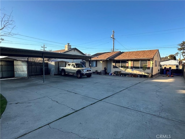 view of front of house with a carport