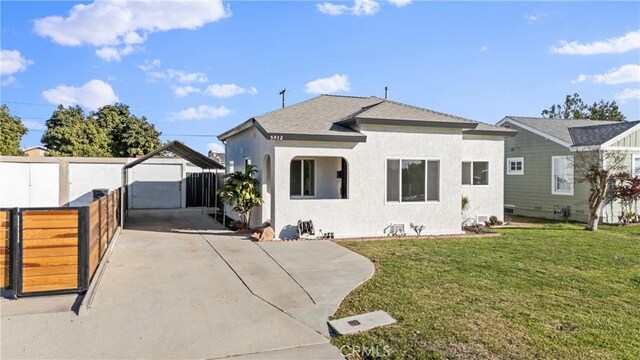 bungalow with a front lawn