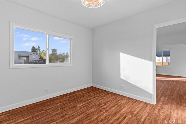 spare room featuring hardwood / wood-style flooring