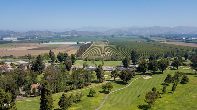 birds eye view of property with a mountain view and a rural view