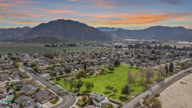 aerial view featuring a residential view and a mountain view
