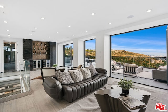 living room with light hardwood / wood-style floors